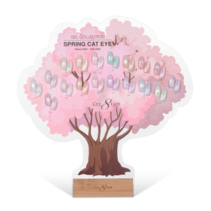 Cre8tion Spring Cat Eye display shaped as a pink blossom tree, holding pastel swatch tips on a wood base.