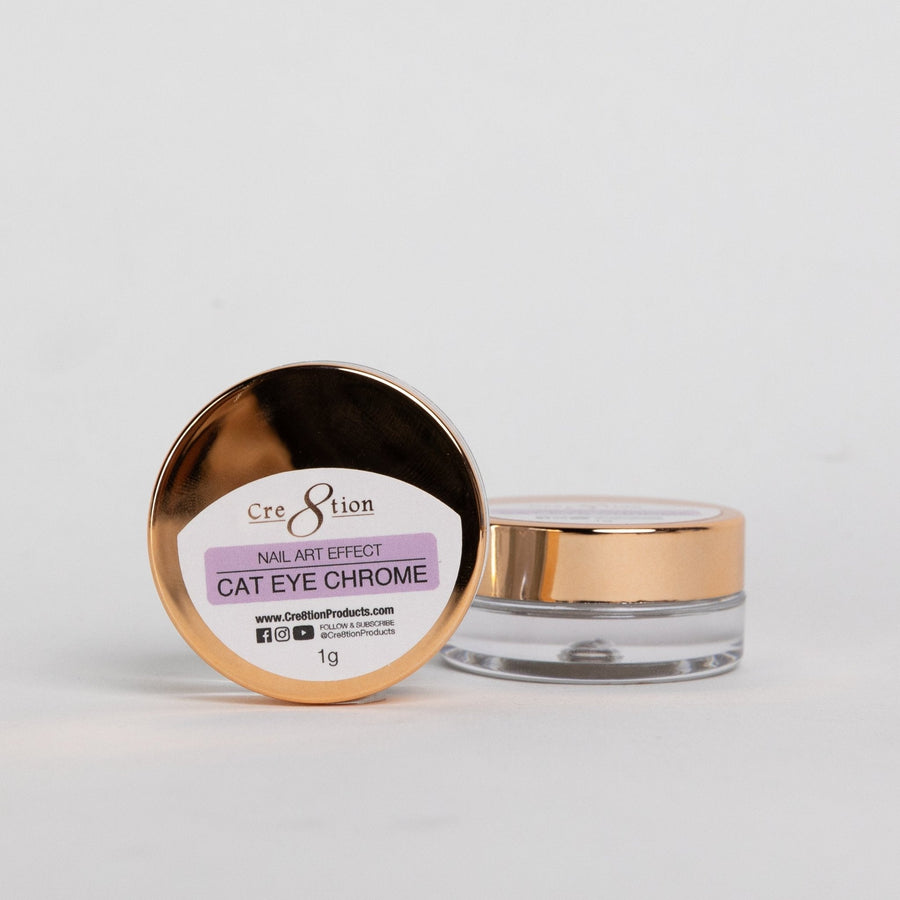 Cre8tion Cat Eye Chrome nail art powder in an open gold jar