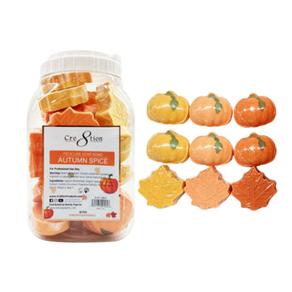 Cre8tion Autumn Spice pedicure soak bomb jar beside rows of soak bombs molded as pumpkins.
