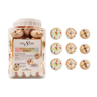 Jar of Cre8tion 40g donut soak bombs with nine loose donuts showing sprinkles and caramel drizzle.