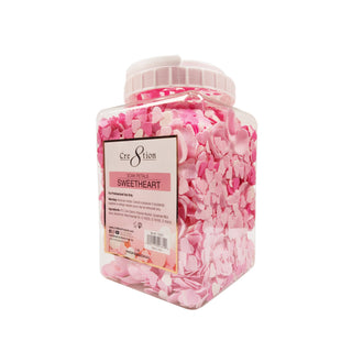 Square jar of Cre8tion Sweetheart soak petals, pink and white flower petals, angled on white.