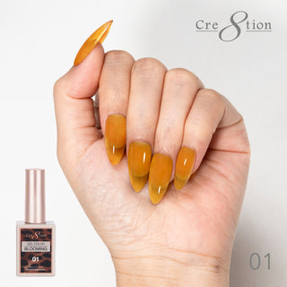 Hand with amber blooming gel nails beside the Cre8tion Blooming Gel 01 bottle.