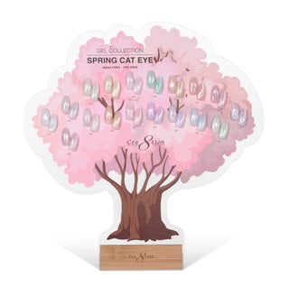 Cre8tion Spring Cat Eye display shaped as a pink blossom tree, holding pastel swatch tips on a wood base.