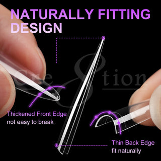 Close up of a clear Cre8tion almond tip held in hand, thickened front edge and thin back edge labeled.