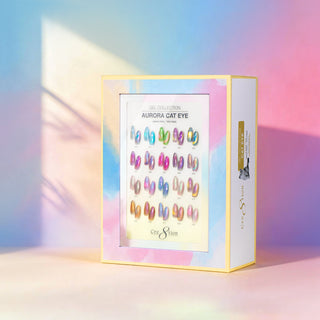 Cre8tion Aurora cat eye kit box with 20 swatch tips, shot against an iridescent pastel backdrop.