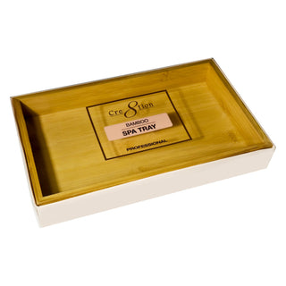 Plain rectangular Cre8tion bamboo spa tray with a printed band, resting in its white box.