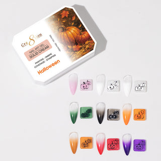 Cre8tion Halloween Solid Cream art gel palette with a pumpkin lid and swatch nails showing ghosts and cats.