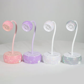 Four Cre8tion 12W rechargeable gooseneck lamps with glitter bases in pink, purple, white and silver.