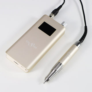 Cream Beige Cre8tion Cordless E-File control unit and handpiece