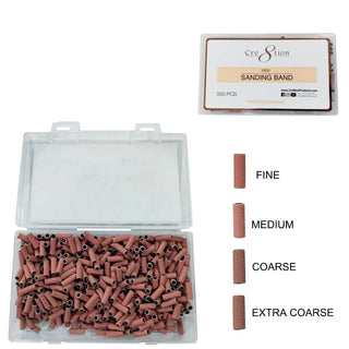 Clear box of 500 pink Cre8tion mini sanding bands with a grit key from fine to extra coarse.