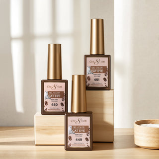 Cre8tion Cat Eye Tea & Coffee gel bottles on a wooden table