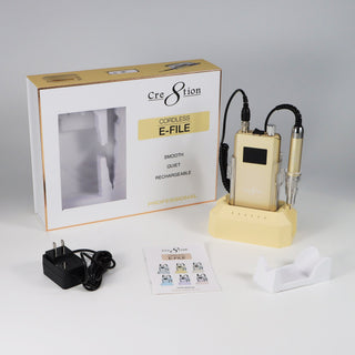 Light Yellow Cre8tion Cordless E-File with its box, charging dock, adapter, manual and handpiece rest